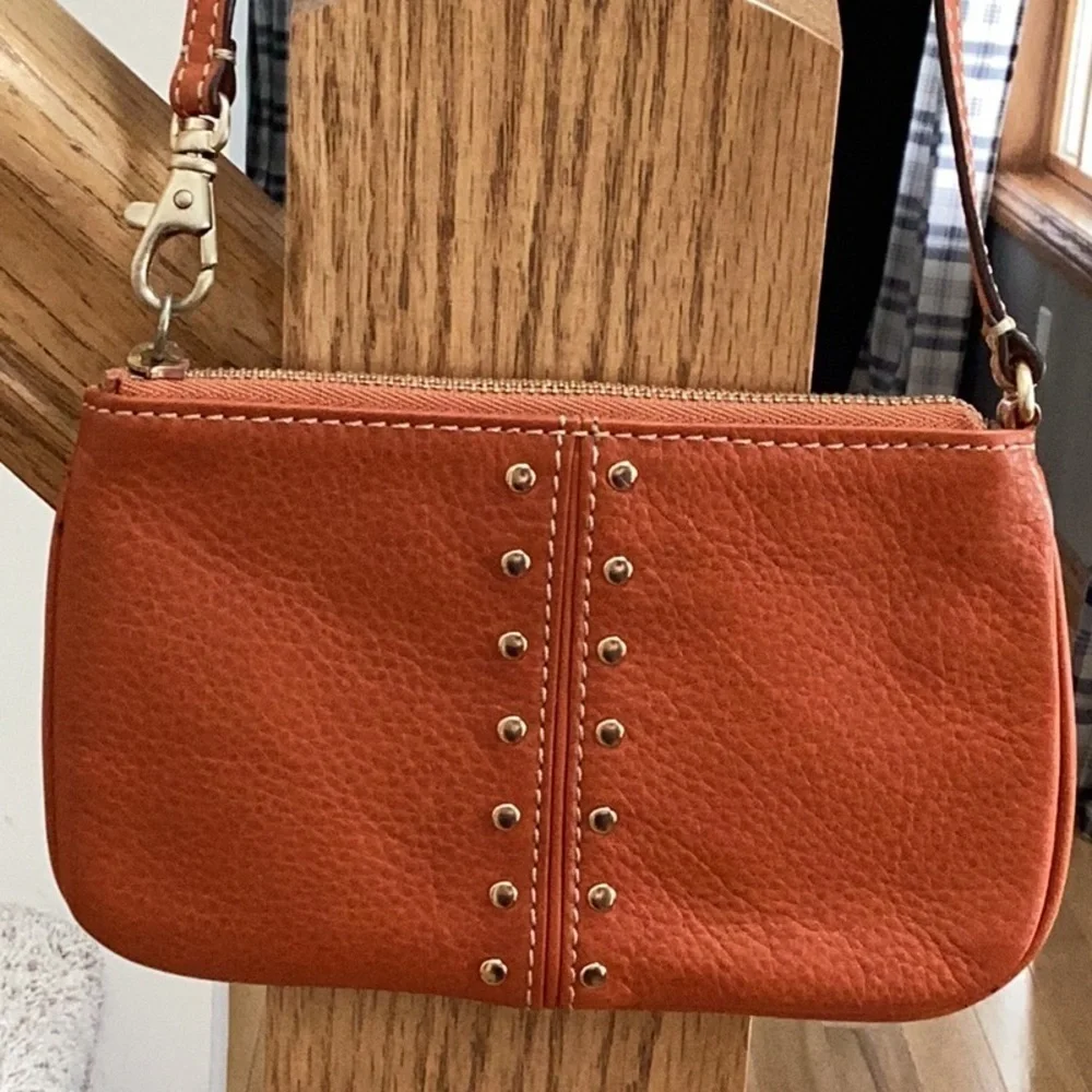 Michael Kors orange, gold tone Studded wristlet, clutch, zipper pouch